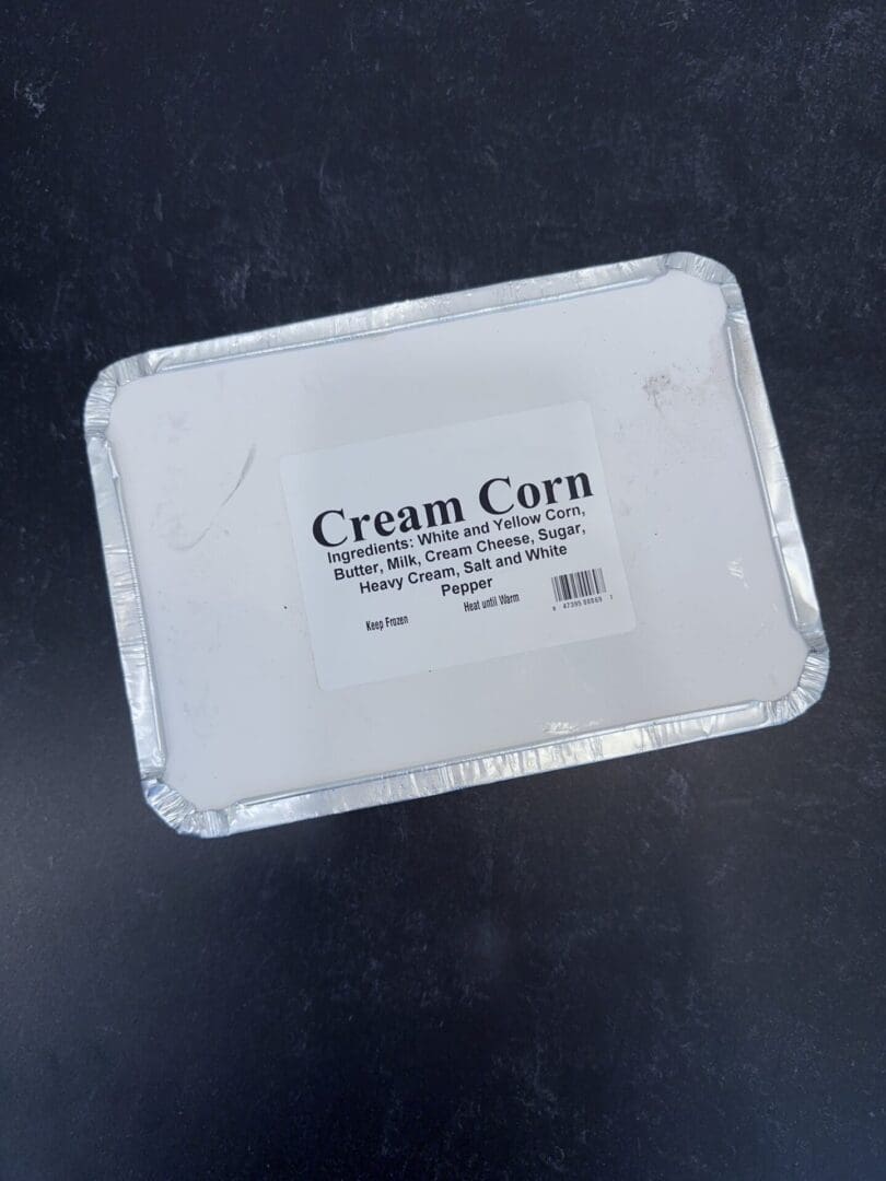 A white container with a black label on it