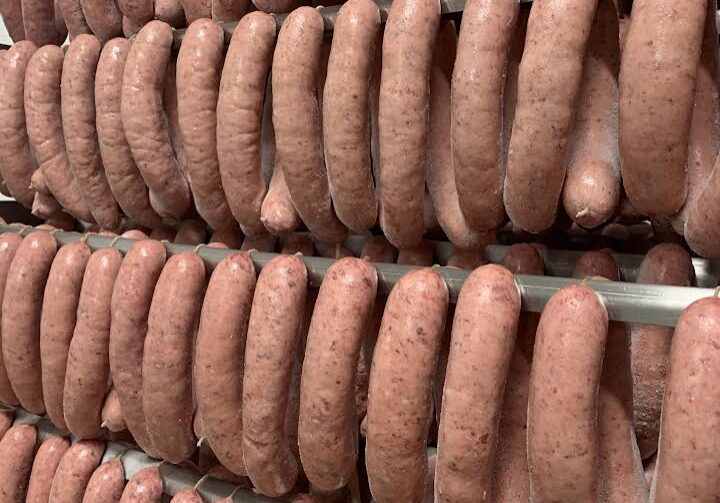 A bunch of sausages are stacked on top of each other